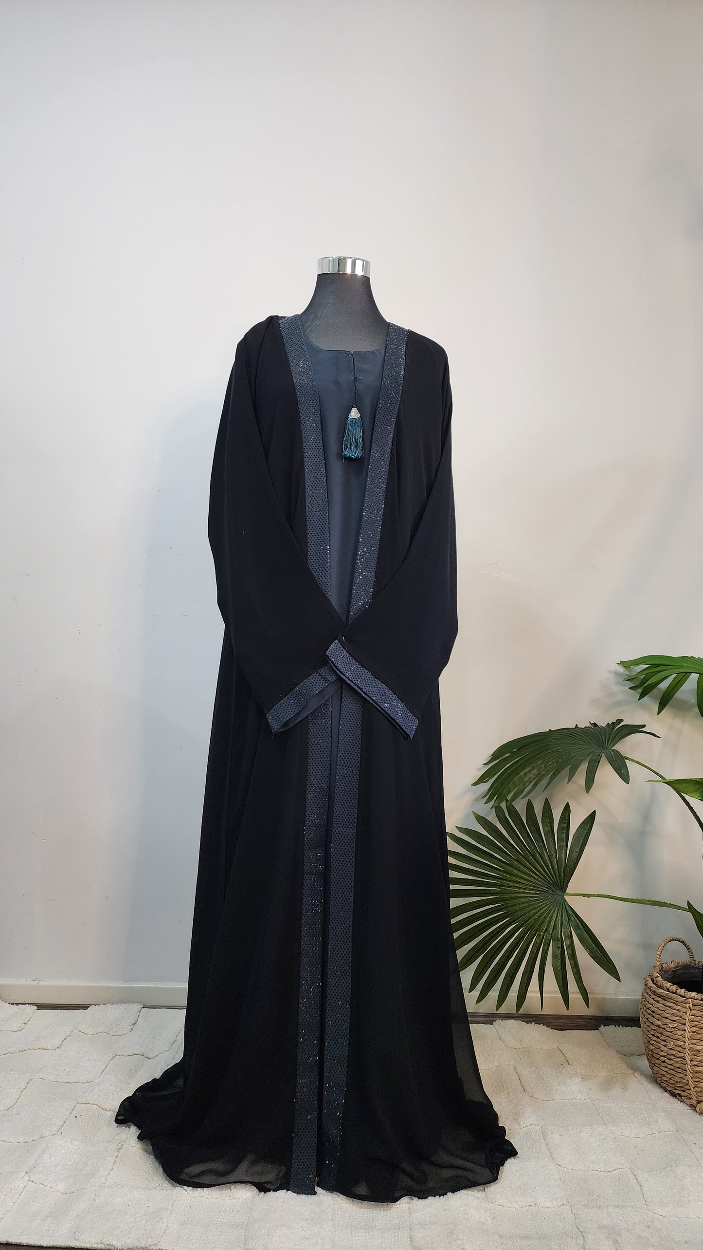 Black Double layered Abaya with Shimmering Teal Border – Elegant Modest Wear with Tassel Accent