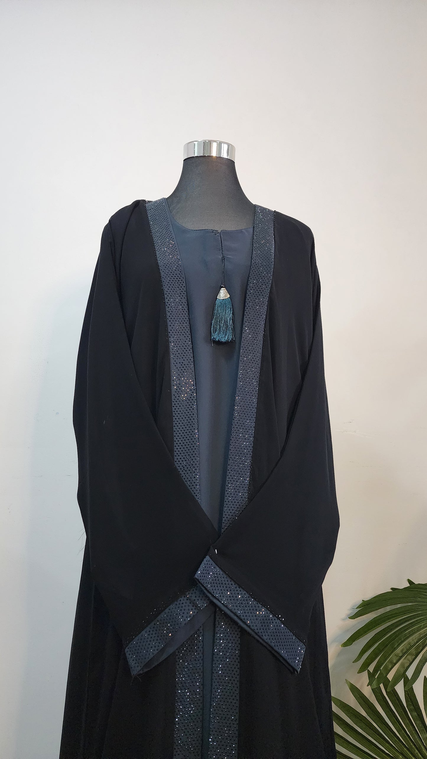 Black Double layered Abaya with Shimmering Teal Border – Elegant Modest Wear with Tassel Accent