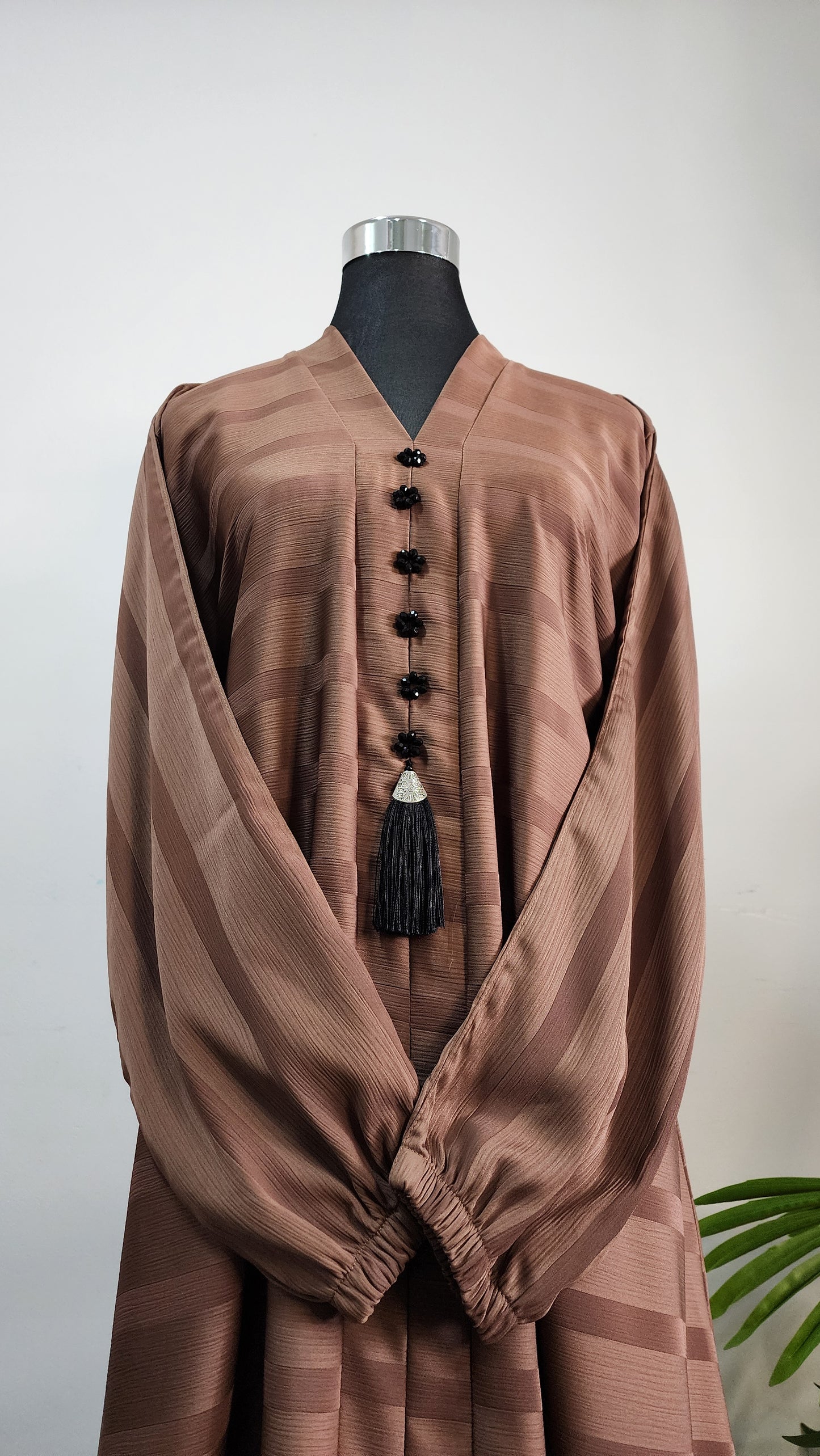 Brown Striped Abaya with Black Button Tassel Detail – Elegant Everyday Modest Wear