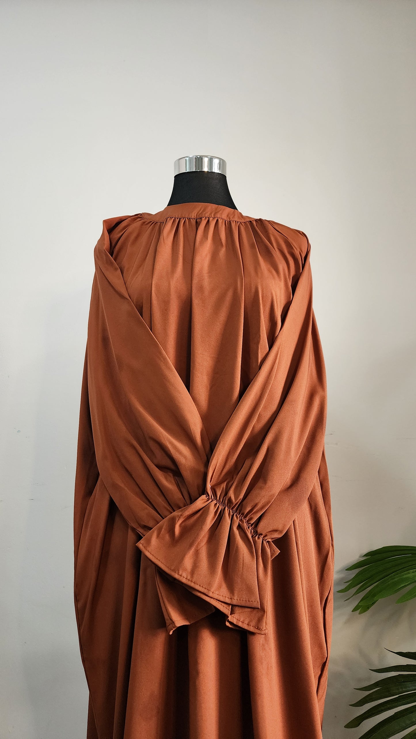 Rust colored Batwing sleeves Abaya – Flowing Modest Wear with Statement Sleeves