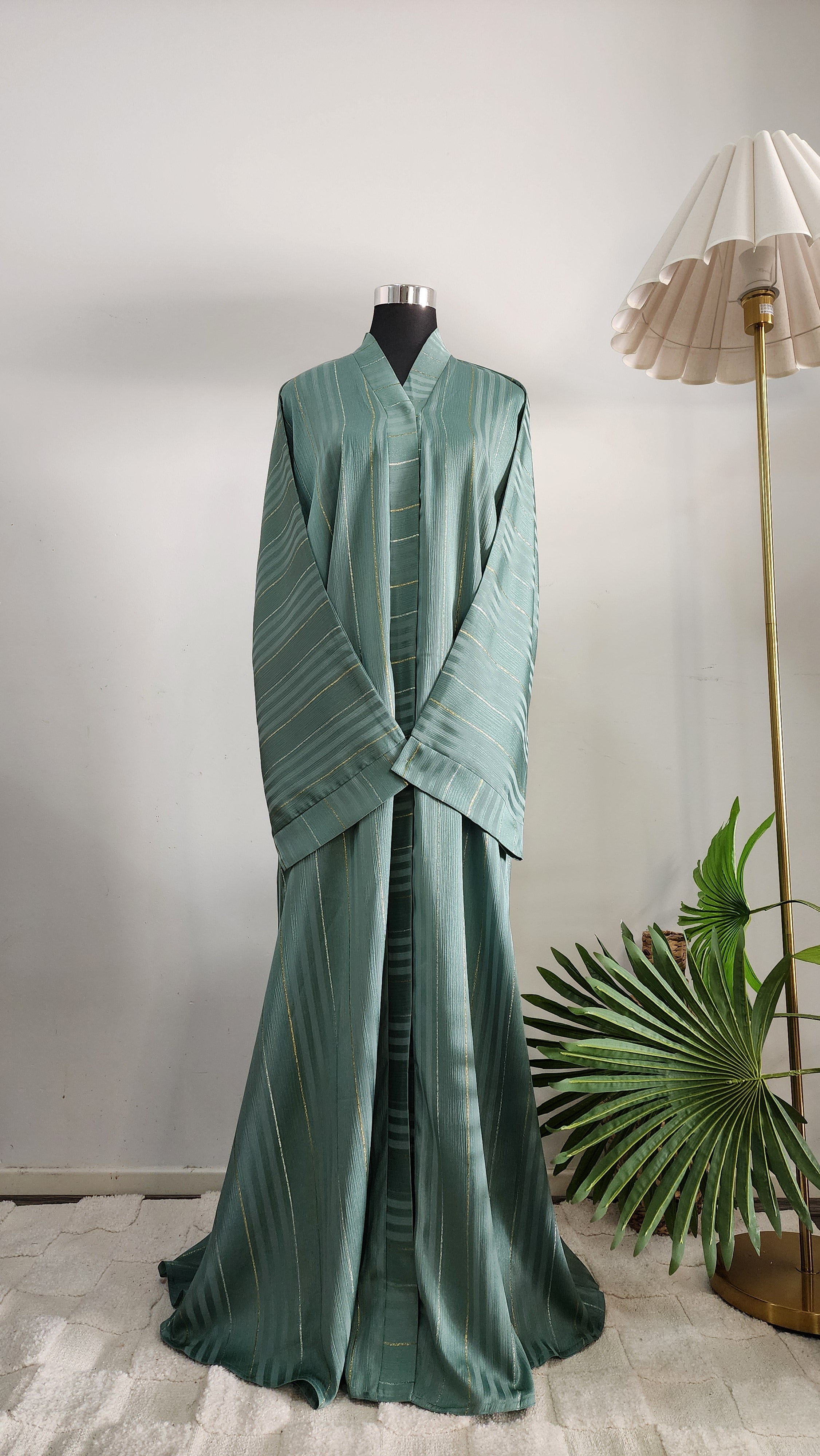 Sage Green Striped Abaya with Subtle Gold Detailing – Elegant Modest Wear