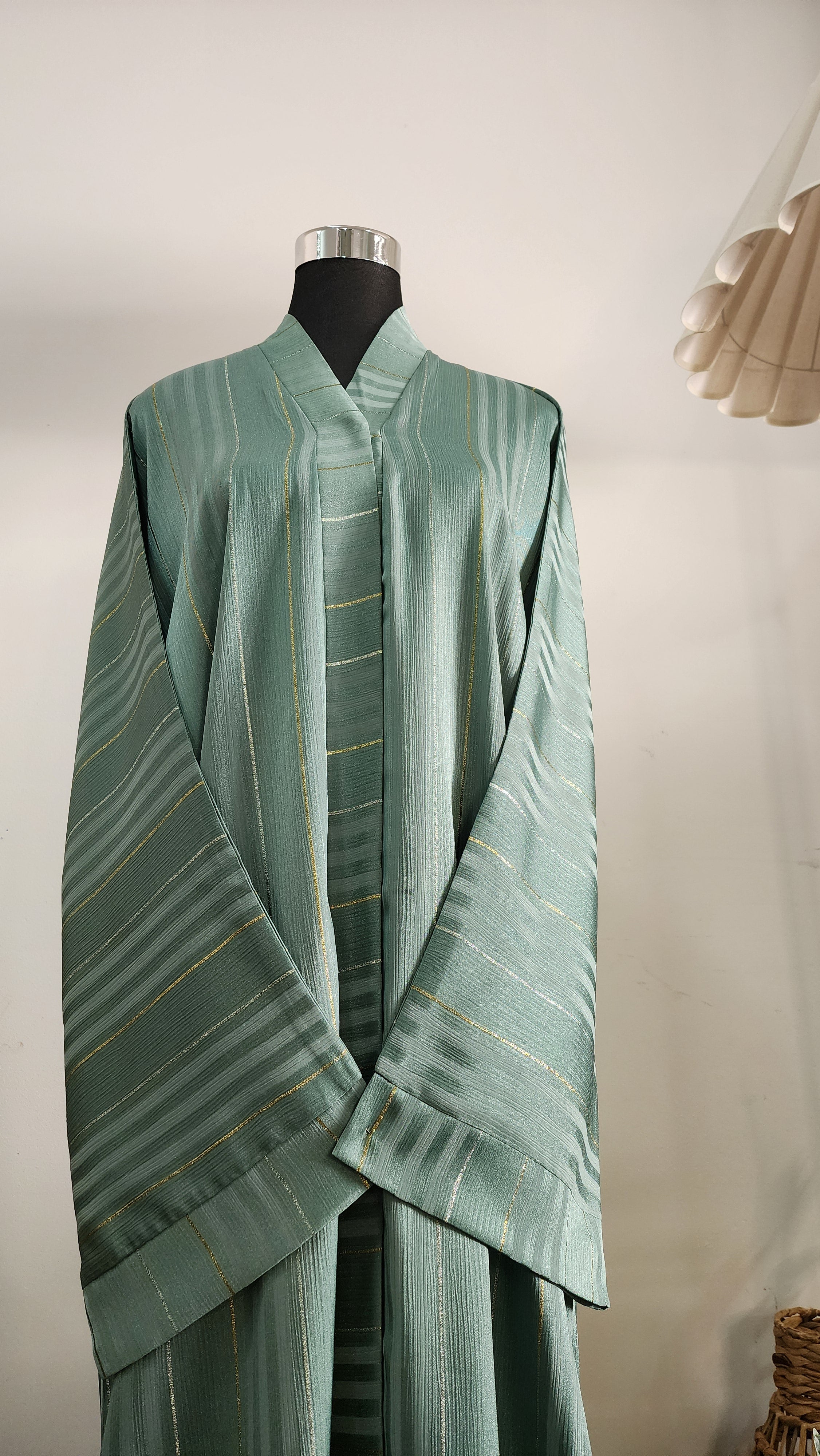 Sage Green Striped Abaya with Subtle Gold Detailing – Elegant Modest Wear