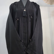 Elegant Black Abaya with Hand Beaded Embroidery and Tassel Detail – Modest Luxury Wear