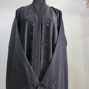 Charcoal Abaya with Beaded Detailing and Tassel Accents – Modern Modest Elegance