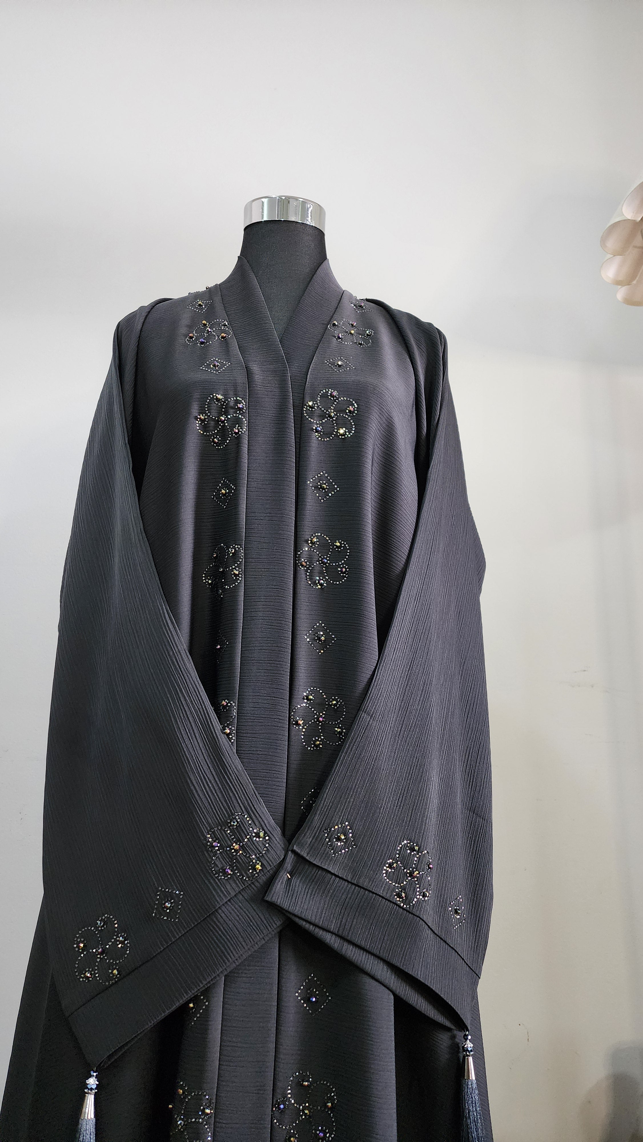 Charcoal Abaya with Beaded Detailing and Tassel Accents – Modern Modest Elegance
