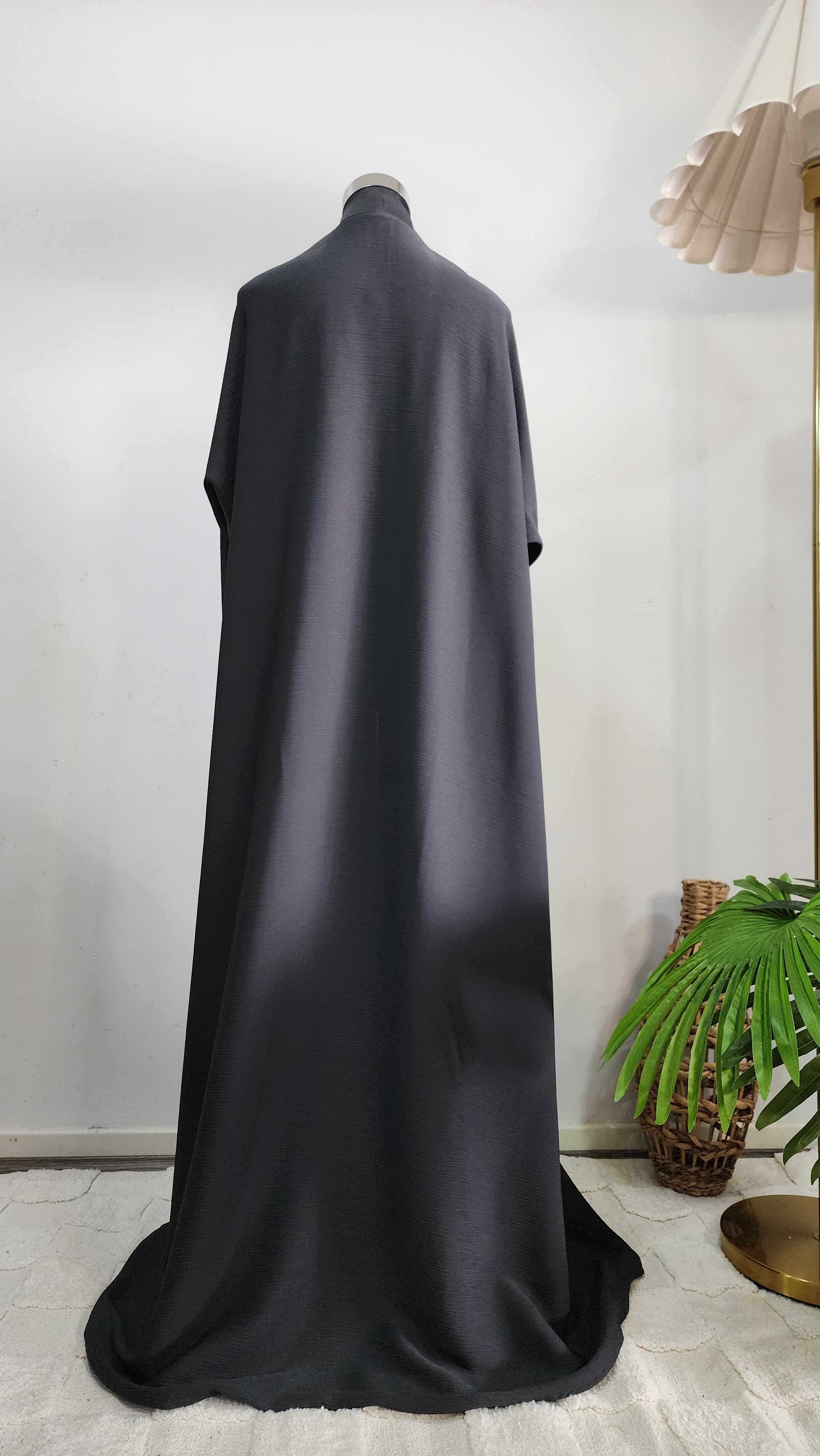 Charcoal Abaya with Beaded Detailing and Tassel Accents – Modern Modest Elegance