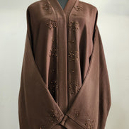Brown Abaya with Beaded Detailing and Tassel Accents – Modern Modest Elegance